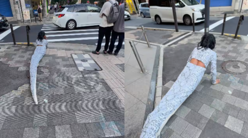 കൂറ്റൻ പാമ്പിന്റെ വേഷവുമണിഞ്ഞ് തെരുവുകളിലൂടെ ഇഴഞ്ഞുനീങ്ങി ഇൻഫ്ലുവൻസർ